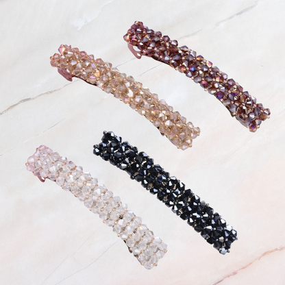 barrette cheveux femme exposer sur table 4 fois